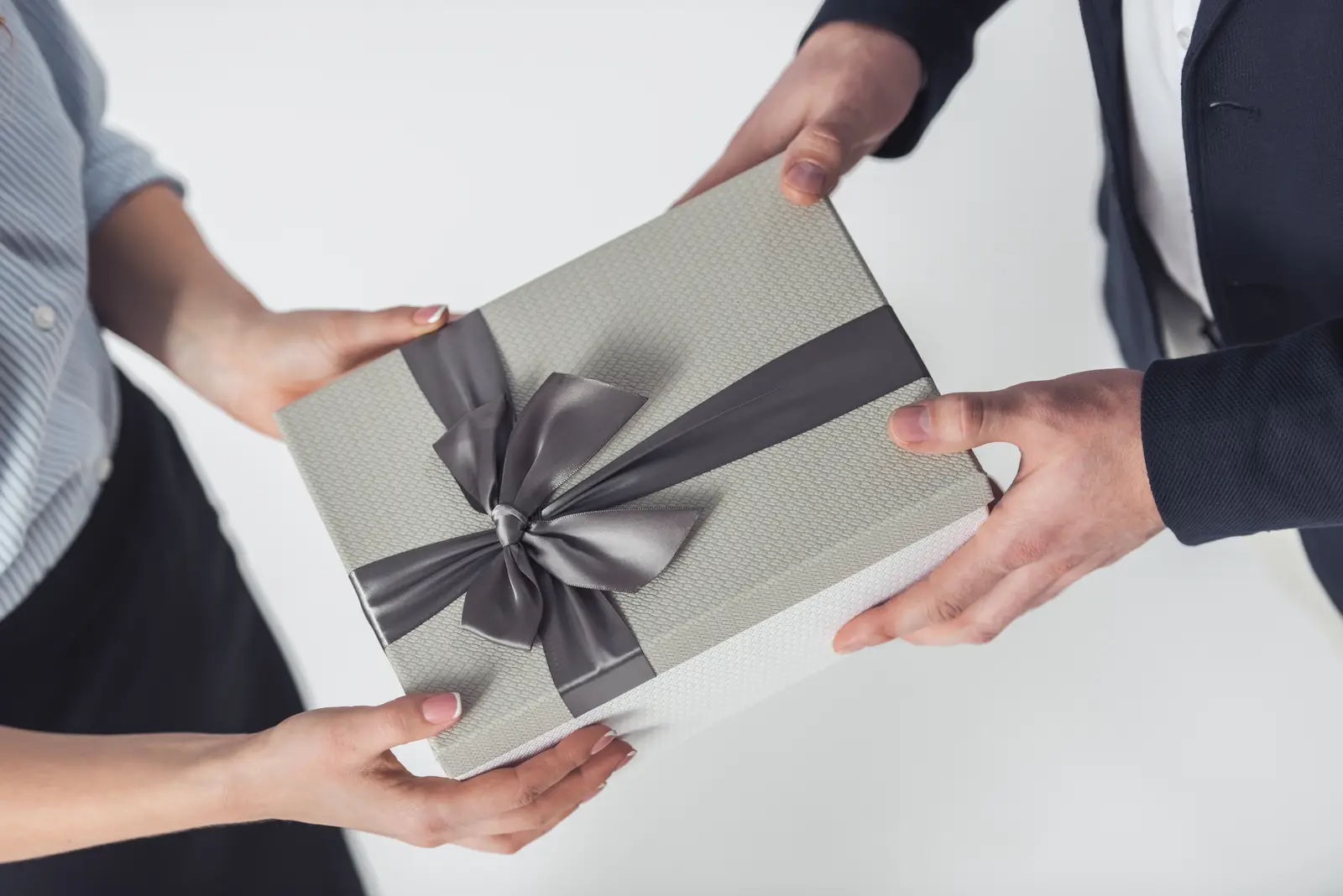 Premium corporate gift box being presented to a colleague