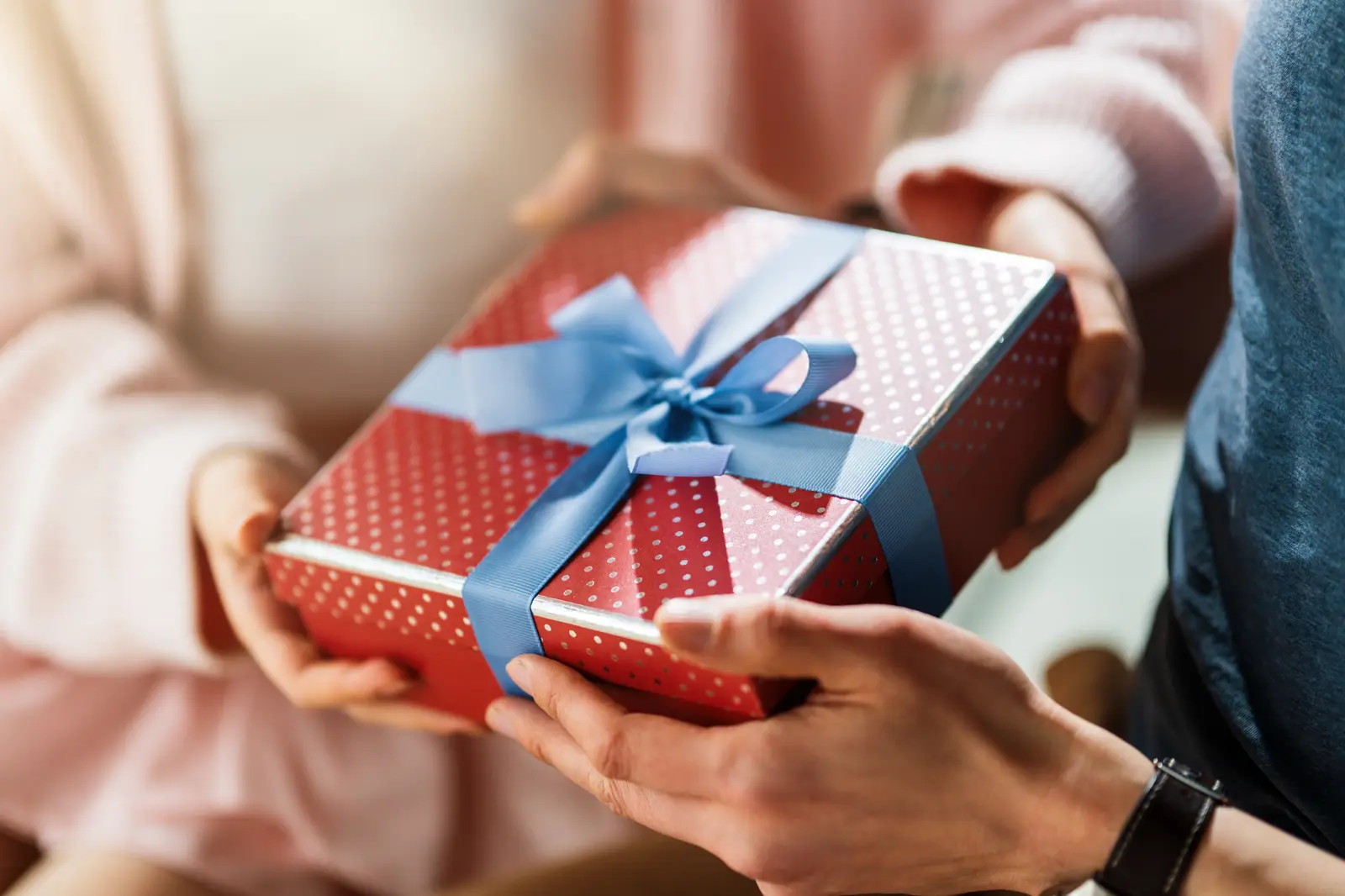 Employee receiving a festive gift box