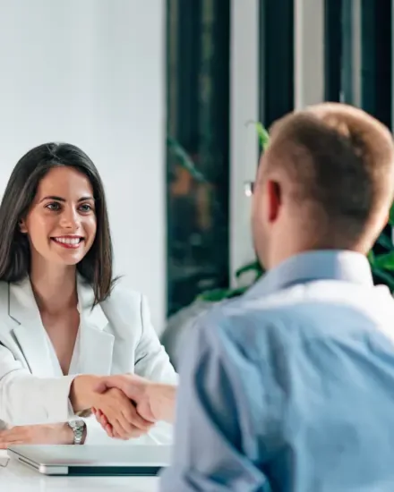 Candidate being welcomed after an interview